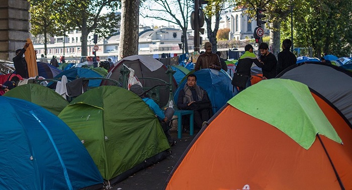 Paris authorities evacuate 2,500 Migrants from camp near Stalingrad Station